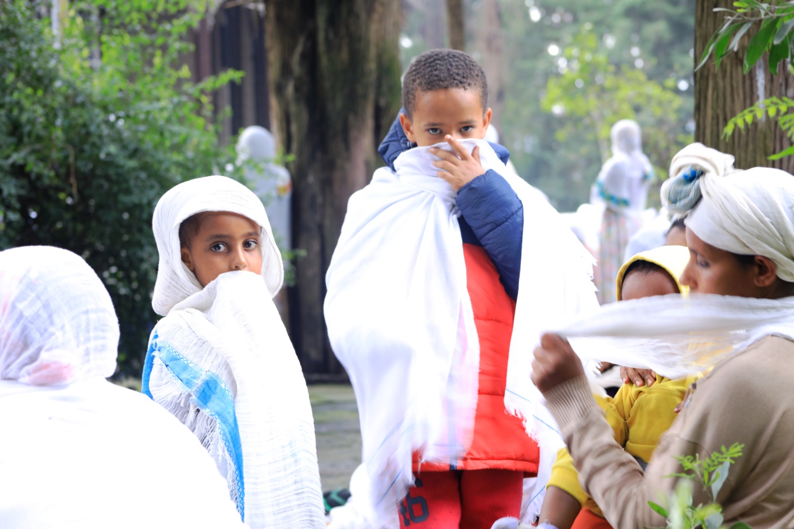 Children in a church courtyard